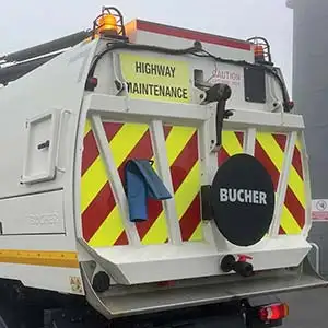 Road sweeper arrow cover