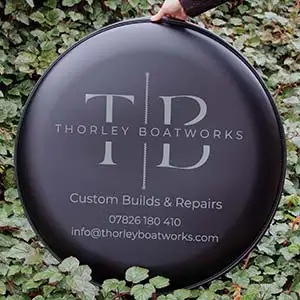 This wheel cover is matt black with grey lettering