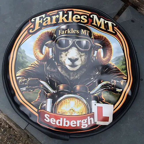 Printed tyre cover. Printed tyre cover.